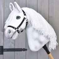 Hobby Horse Elektra with Black Halter by LarDen, a white plush head with grey shading, blue eyes and a long white yarn mane