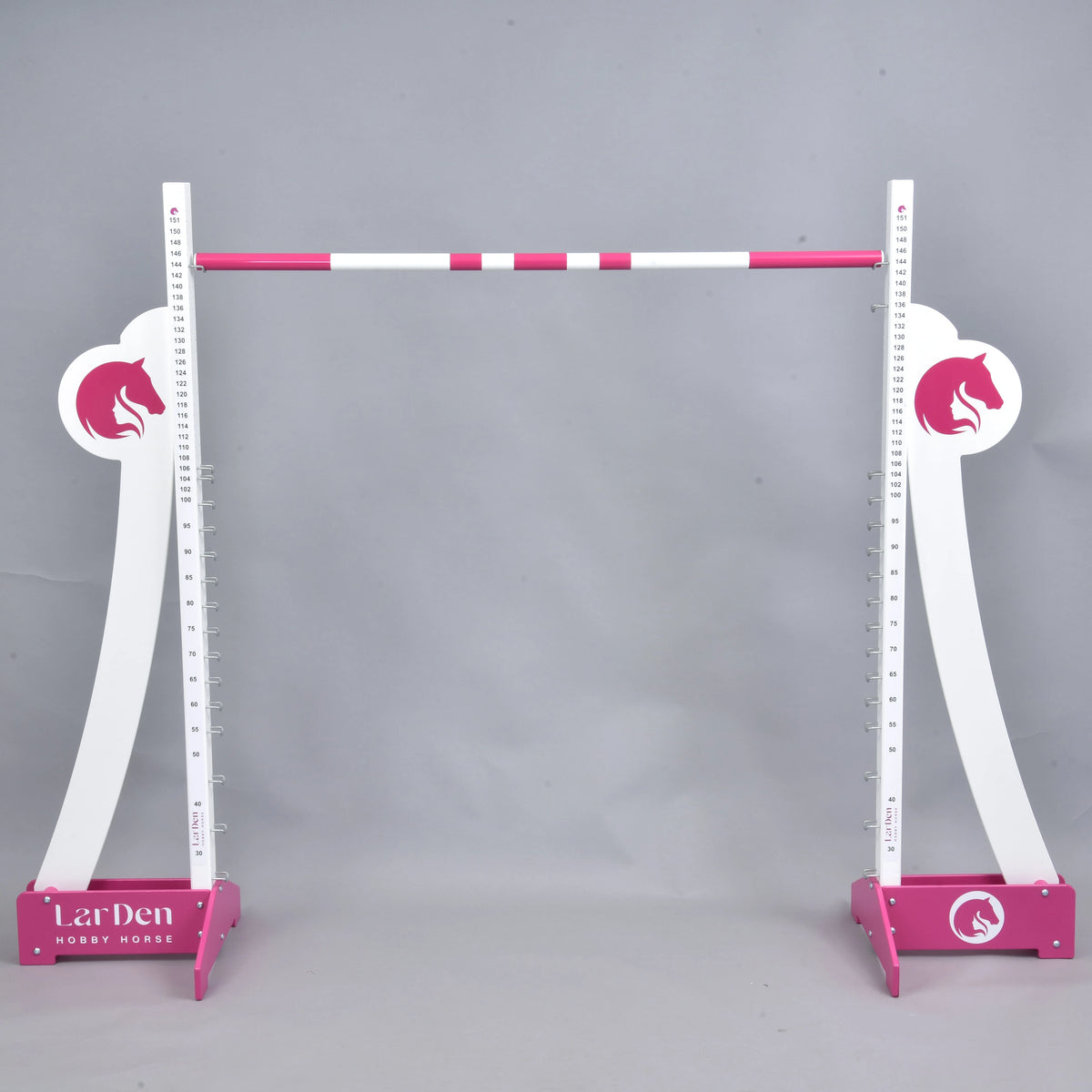 LarDen Hobby Horse Puissance Jump with tall curved white wings, pink horse head logos, pink feet and a pink-white top pole