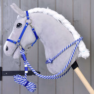 Grey plush Hobby Horse in the blue webbing halter with the blue and white rope cordeo and coiled lead rope