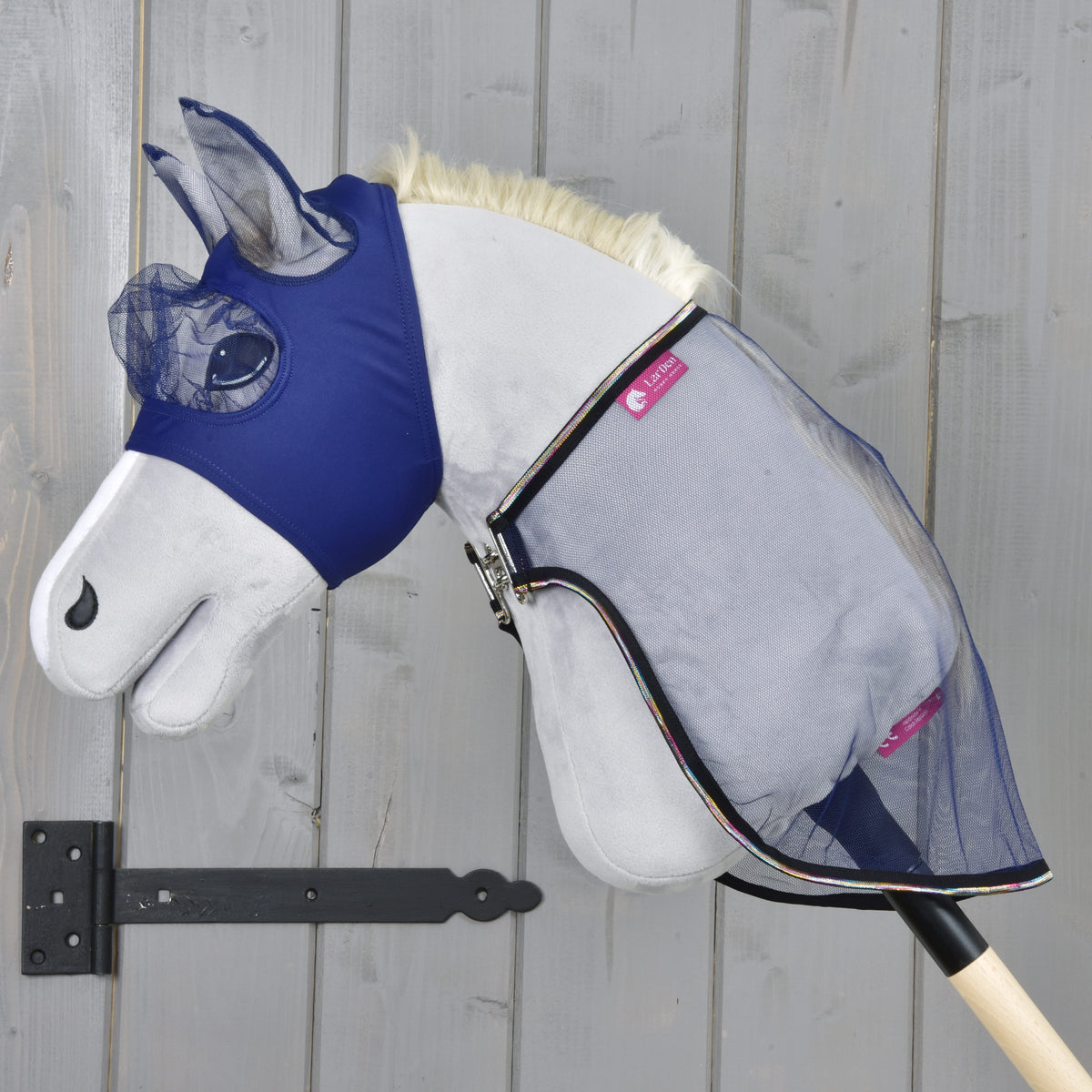 Set Fly Combo on a light grey Hobby Horse in side view, the dark mesh fly sheet reaching down over the wooden stick