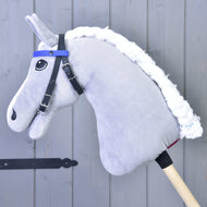 LarDen Bridle with 2 Headbands Blue on a grey plush Hobby Horse, black straps with a plain blue browband