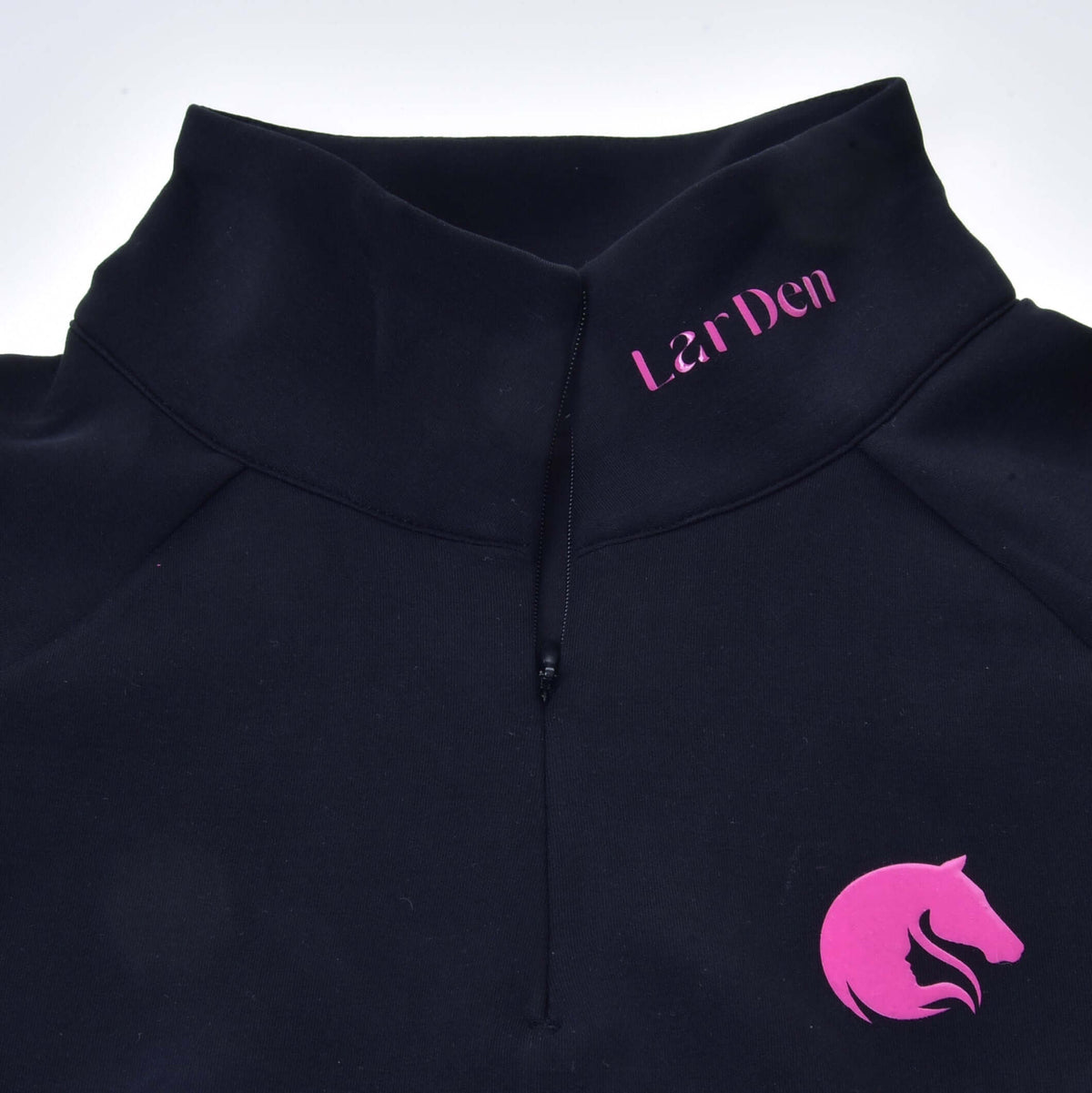 Close-up of the stand-up collar of the Hobby Horse LarDen Sweatshirt with half zip, pink lettering and horse head logo