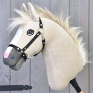 Hobby Horse Pixie with Black Halter by LarDen, a cream plush head with a white blaze, grey muzzle and flowing pale fur mane