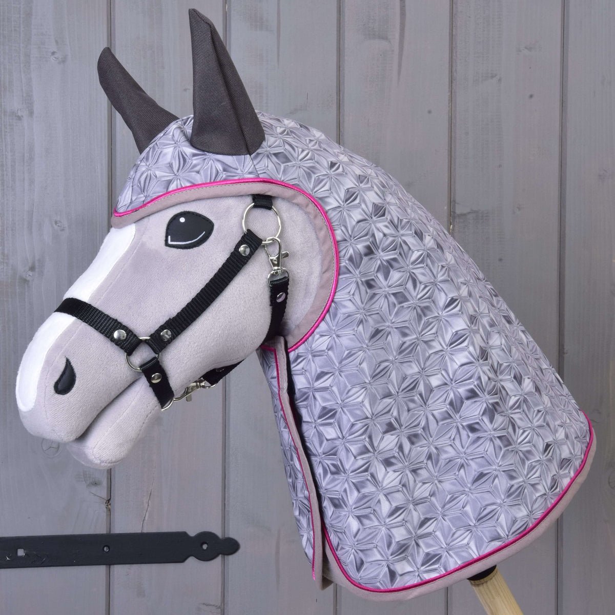 Grey plush Hobby Horse in the Raincoat Valentine with a silver grey geometric print, hot pink piping and dark grey ears