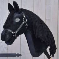 Hobby Horse Mahal with Black Halter by LarDen, a black plush head with a long black yarn mane, side view