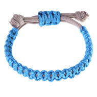 Hobby Horse Bracelet Nature Blue by LarDen, knotted sky blue cord on a beige adjustable band with a blue sliding knot