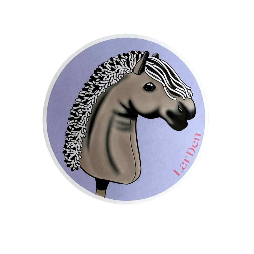 Sticker with a dun Hobby Horse with a curly black and white mane and dark muzzle on a lavender circle