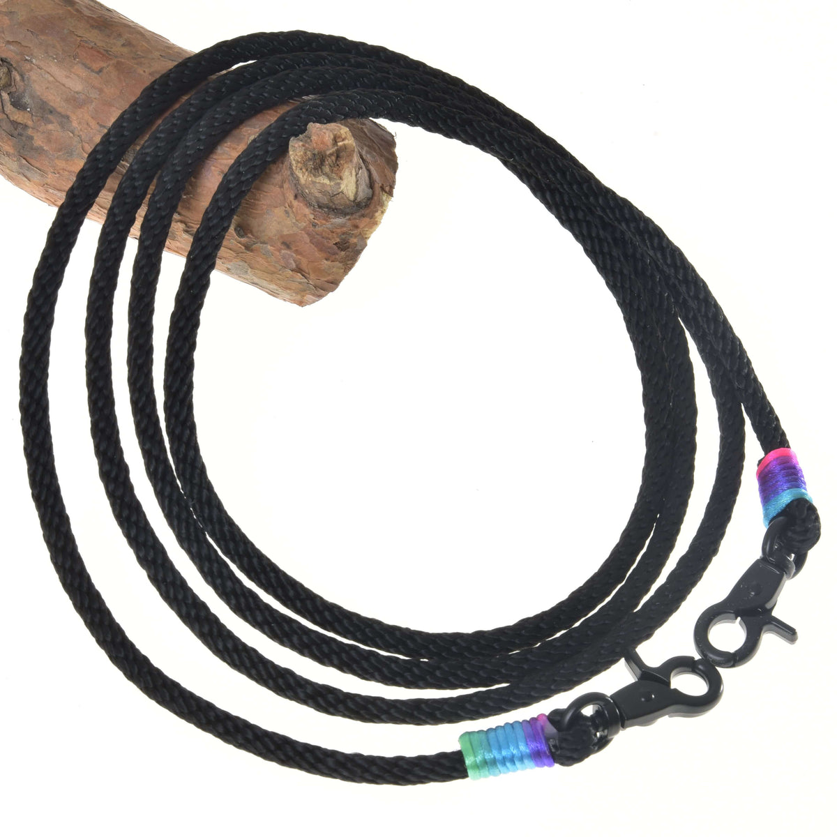 Hobby Horse Western Reins Montana by LarDen, a black braided rope with black snap hooks and purple-blue-green wraps