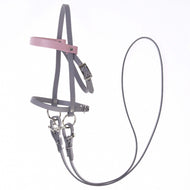 Grey leatherette Hobby Horse bridle with a pale pink browband and long grey reins on a white background